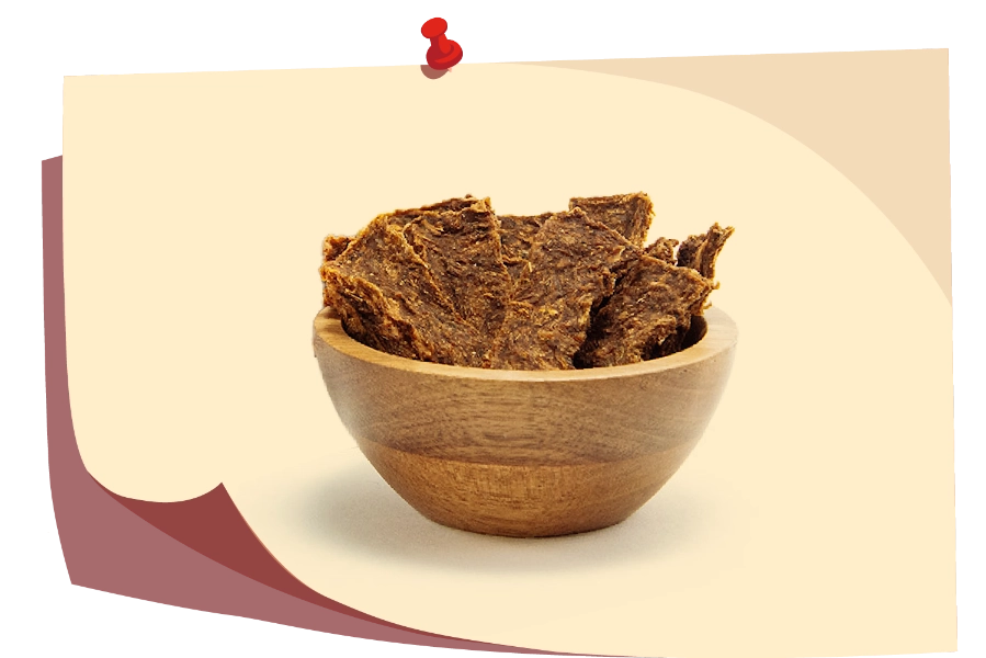 All natural, meatless, vegan jackfruit jerky in a wooden bowl